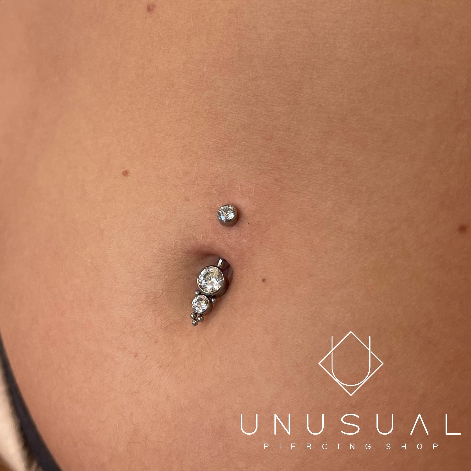 Double Diamond Piercing - UnusualPiercingShop.com