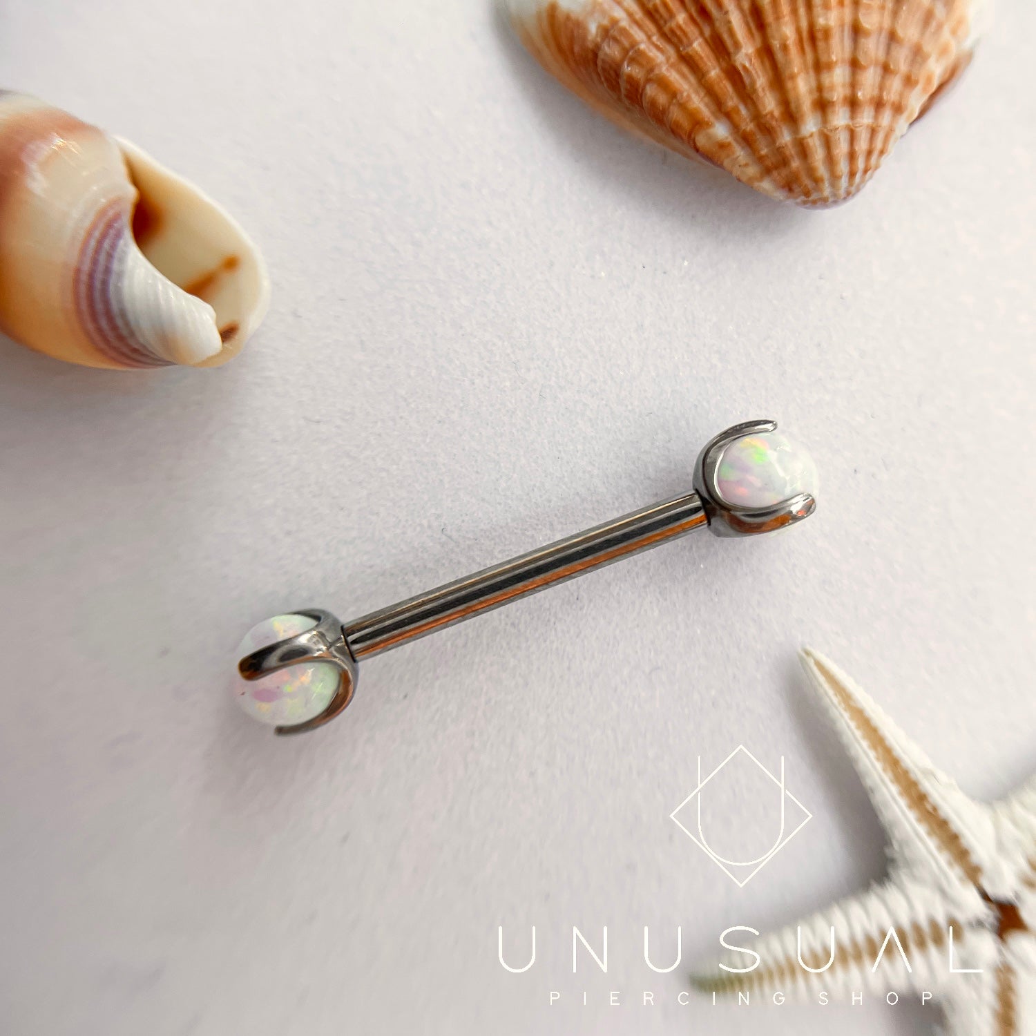 White Opal Nipple Piercing - UnusualPiercingShop.com