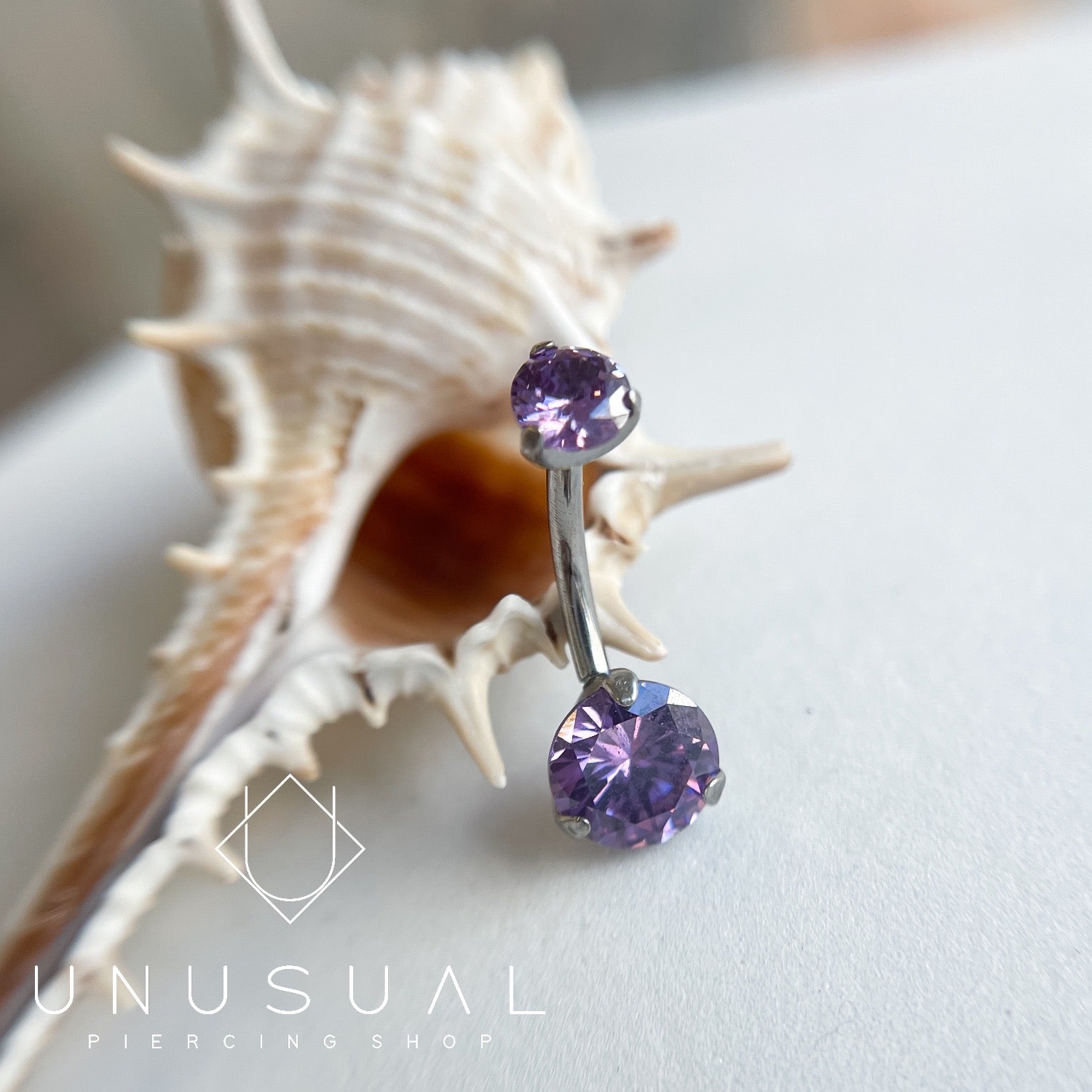 Violet Navel Piercing - UnusualPiercingShop.com